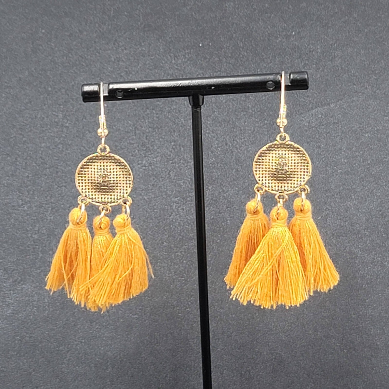 Pierced Earrings Gold tone Orange Tassel Rhinestone Medallion Dangle 1.75"