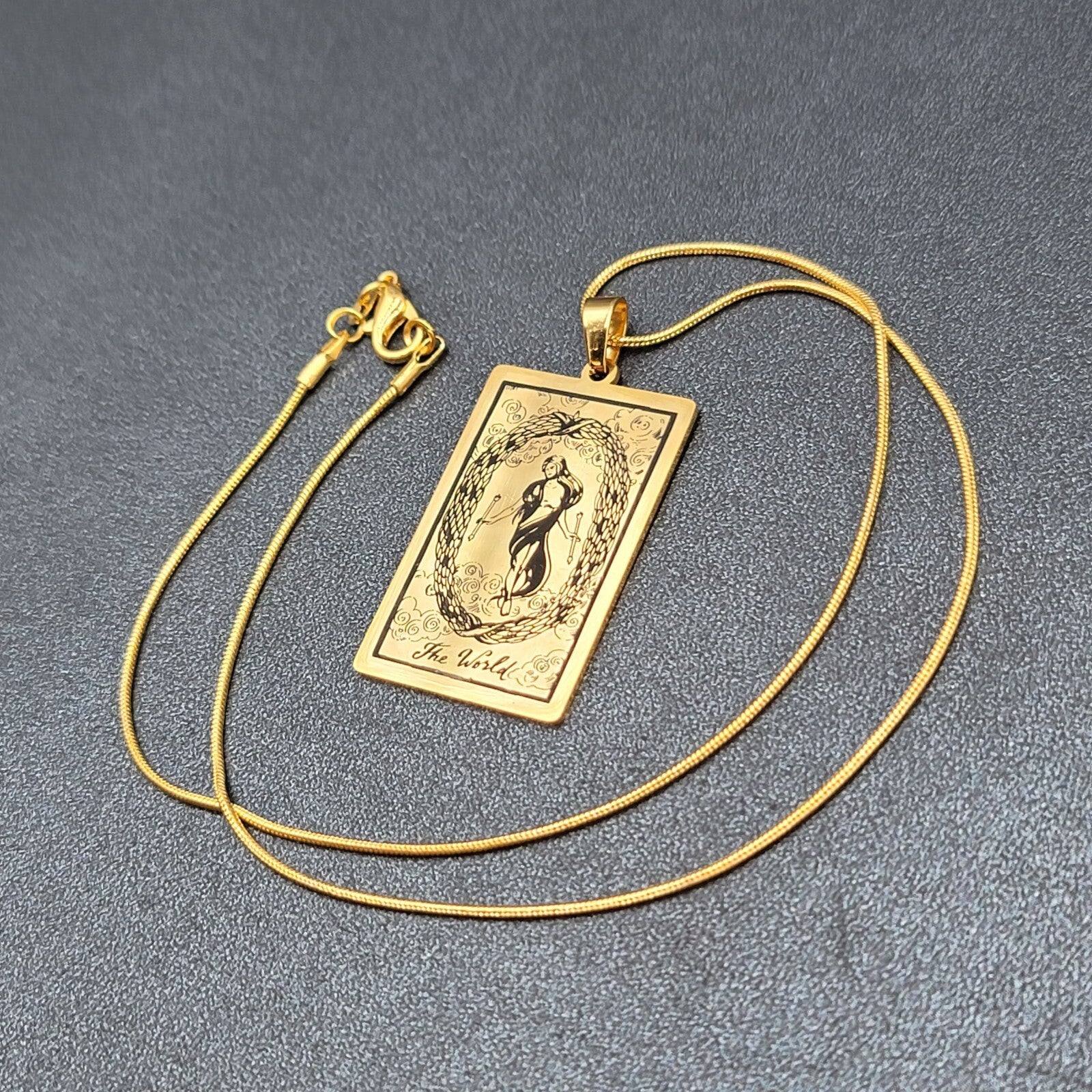 The WORLD Tarot Card Pendant Necklace Major Arcana Gold tone 18”.