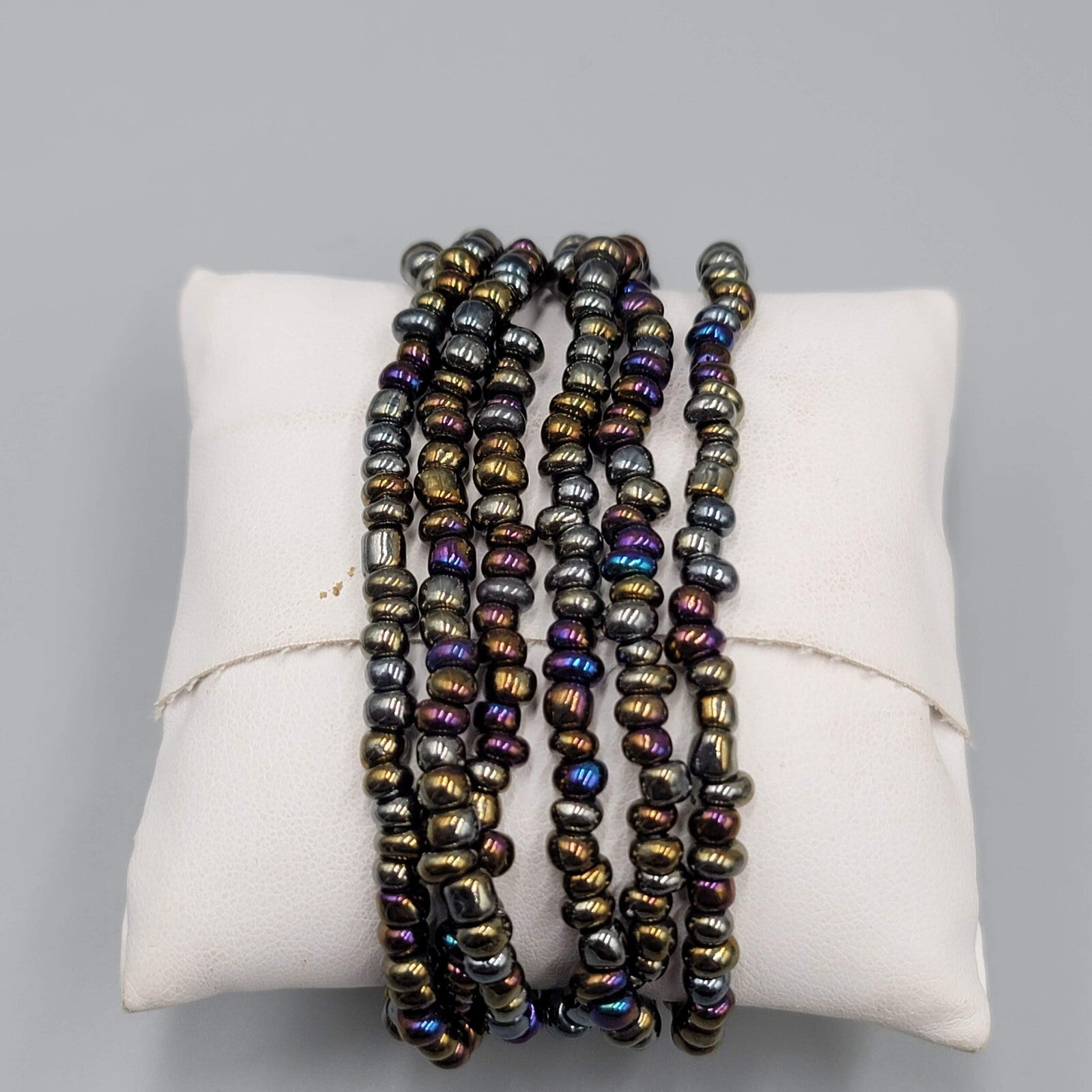 Multi Strand Glass Seed Bead Bracelet with Abalone Shell Ring Accent 6.75 in