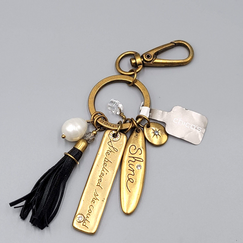 Chicos Keychain SHE BELIEVED SHE COULD Charm keychain Gold tone Black Tassel NWT