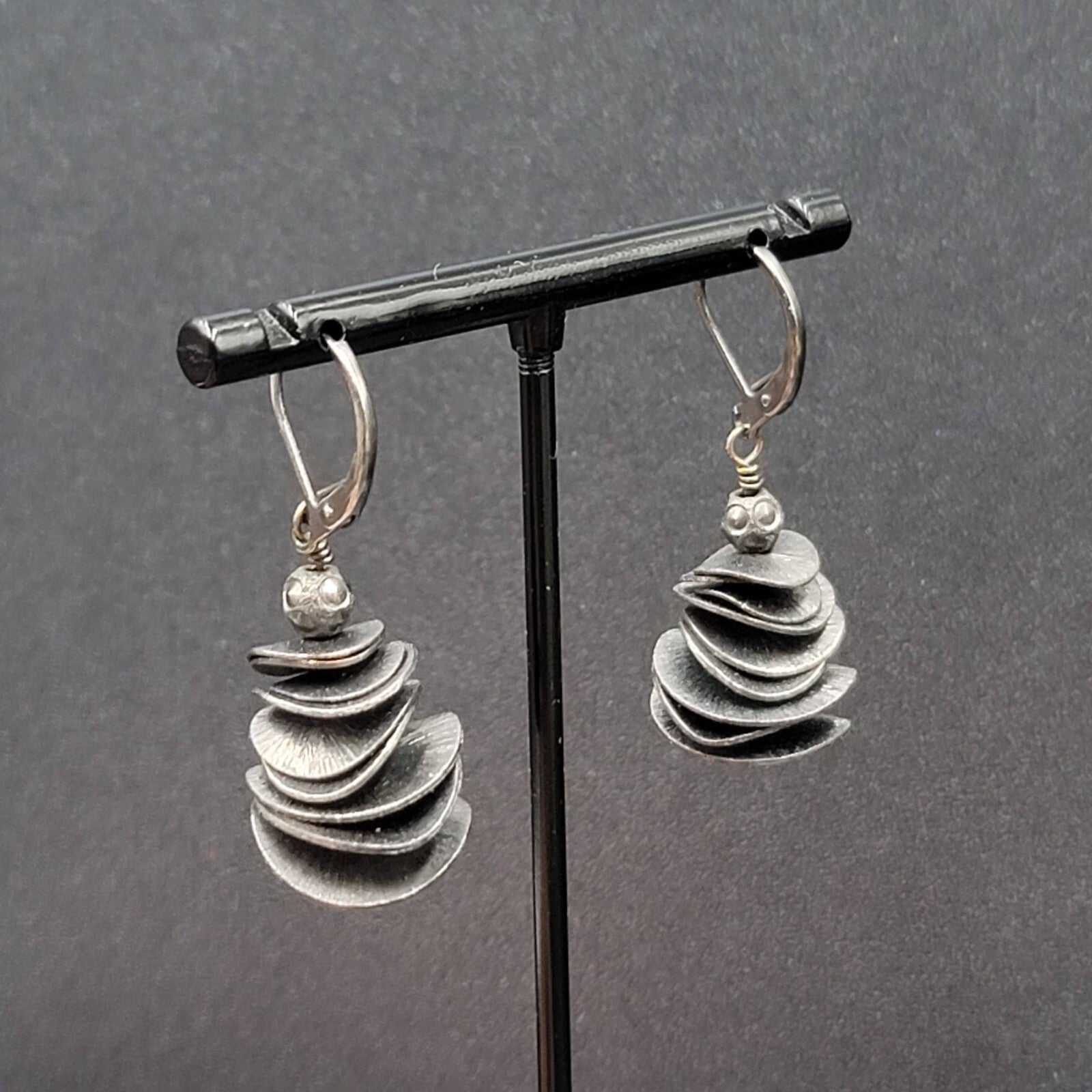 Pierced Earrings Black Metal Layered Wavy Discs Dangle 1 1/8"