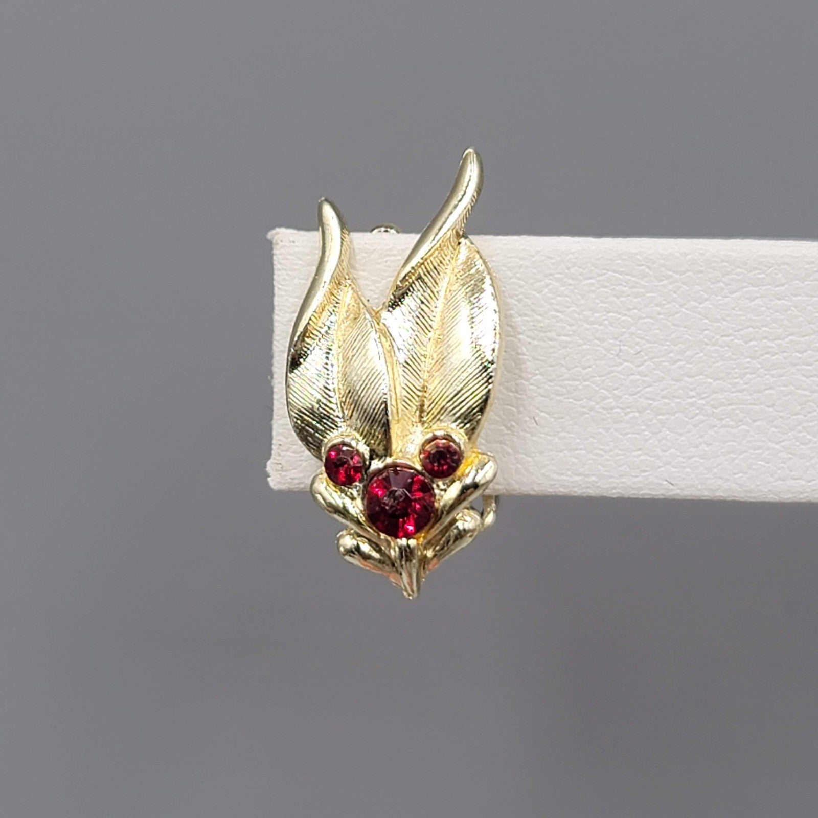 Vintage Red Rhinestone Clip on Earrings Gold tone Leaves 7/8"
