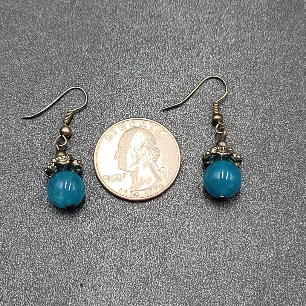 Pierced Earrings Silver tone Filigree Capped Blue Glass Bead Dangle 3/4"
