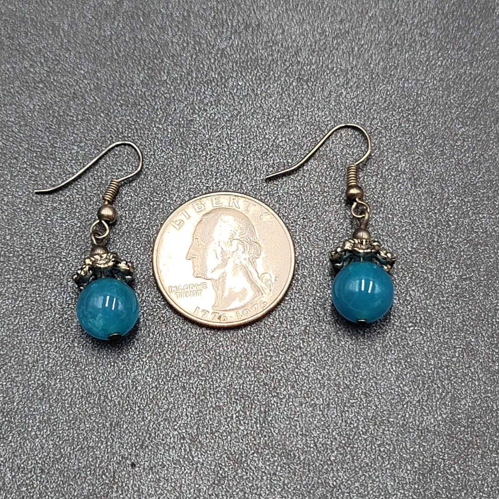 Pierced Earrings Silver tone Filigree Capped Blue Glass Bead Dangle 3/4"
