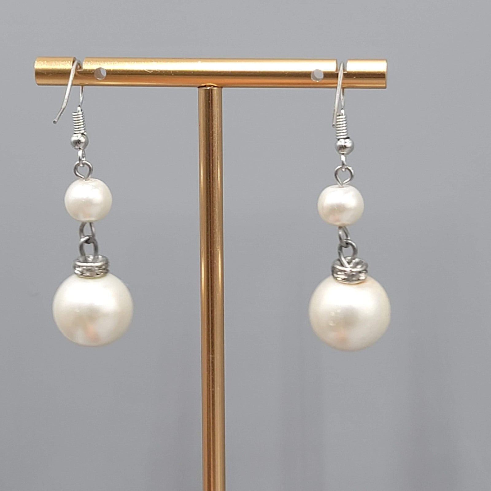 Satin Look White Bead Pierced Earrings Silver tone Dangle 1.25 in