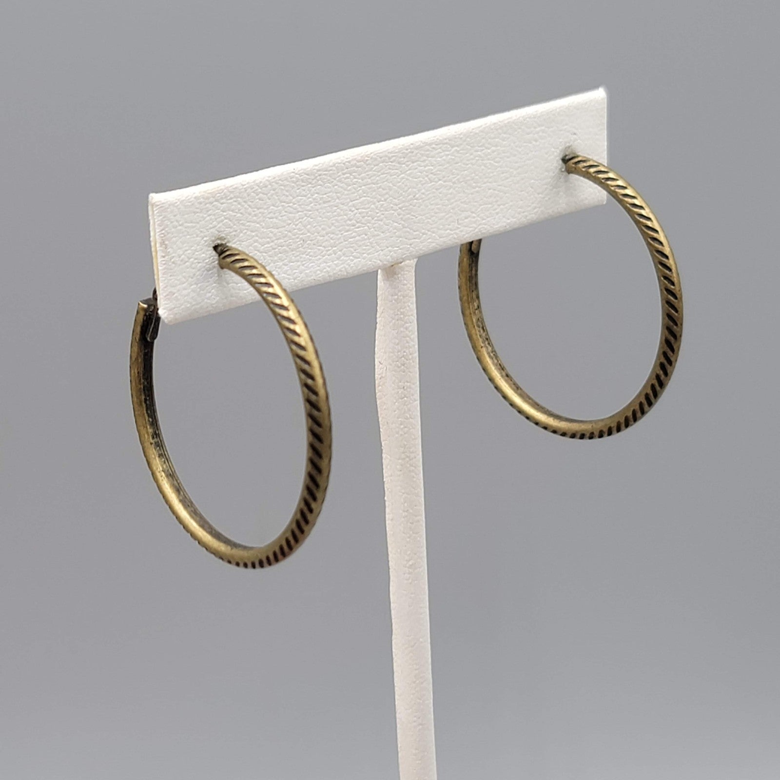 Embossed Thin Hoops Pierced Earrings Bronze tone 1.25 in