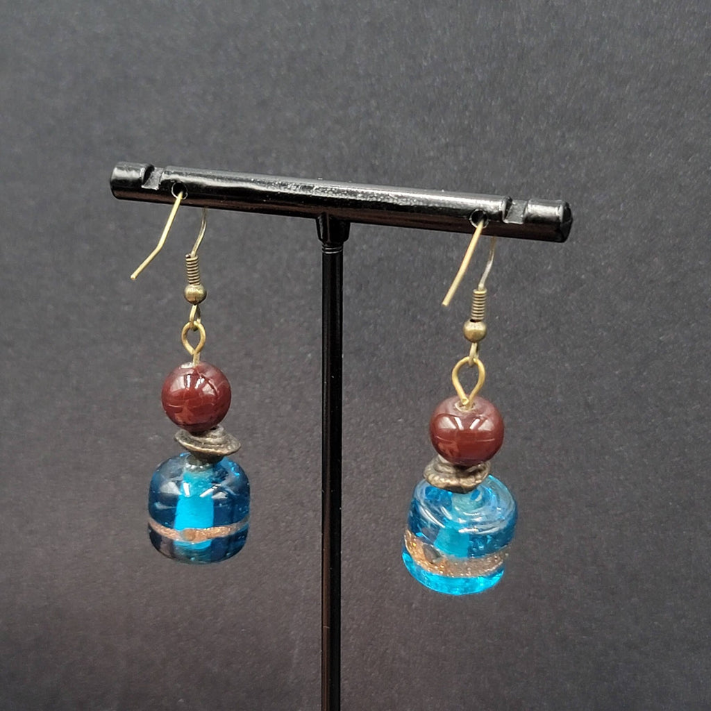 Pierced Earrings Bronze tone Art Glass Blue Bead Dangle 1.25"