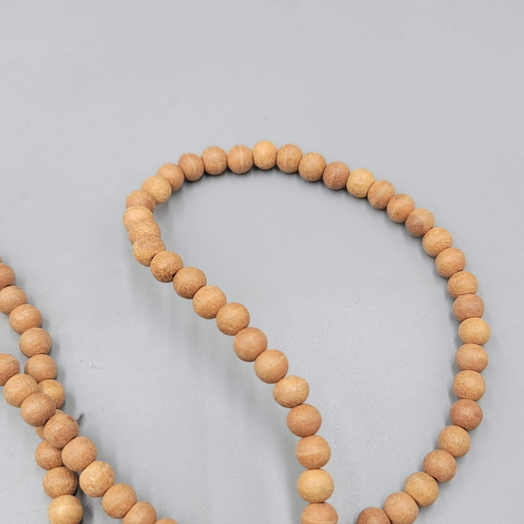 Long Wood and Cow Bone Bead Necklace Large Tassel Pendant 36 in