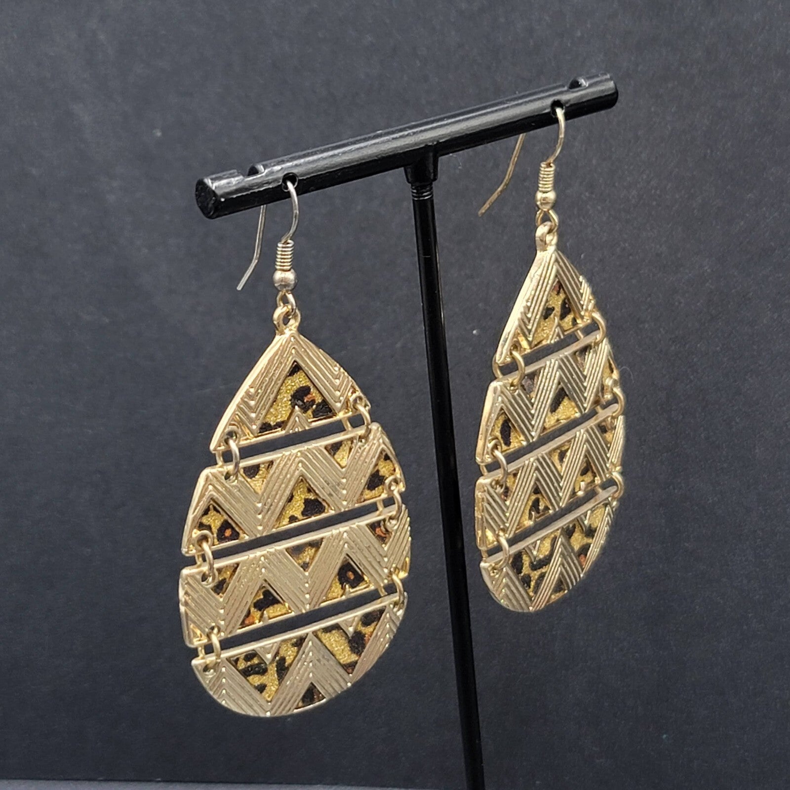 Pierced Earrings Gold tone Articulated Metal Teardrop Leopard Print Dangle 2"