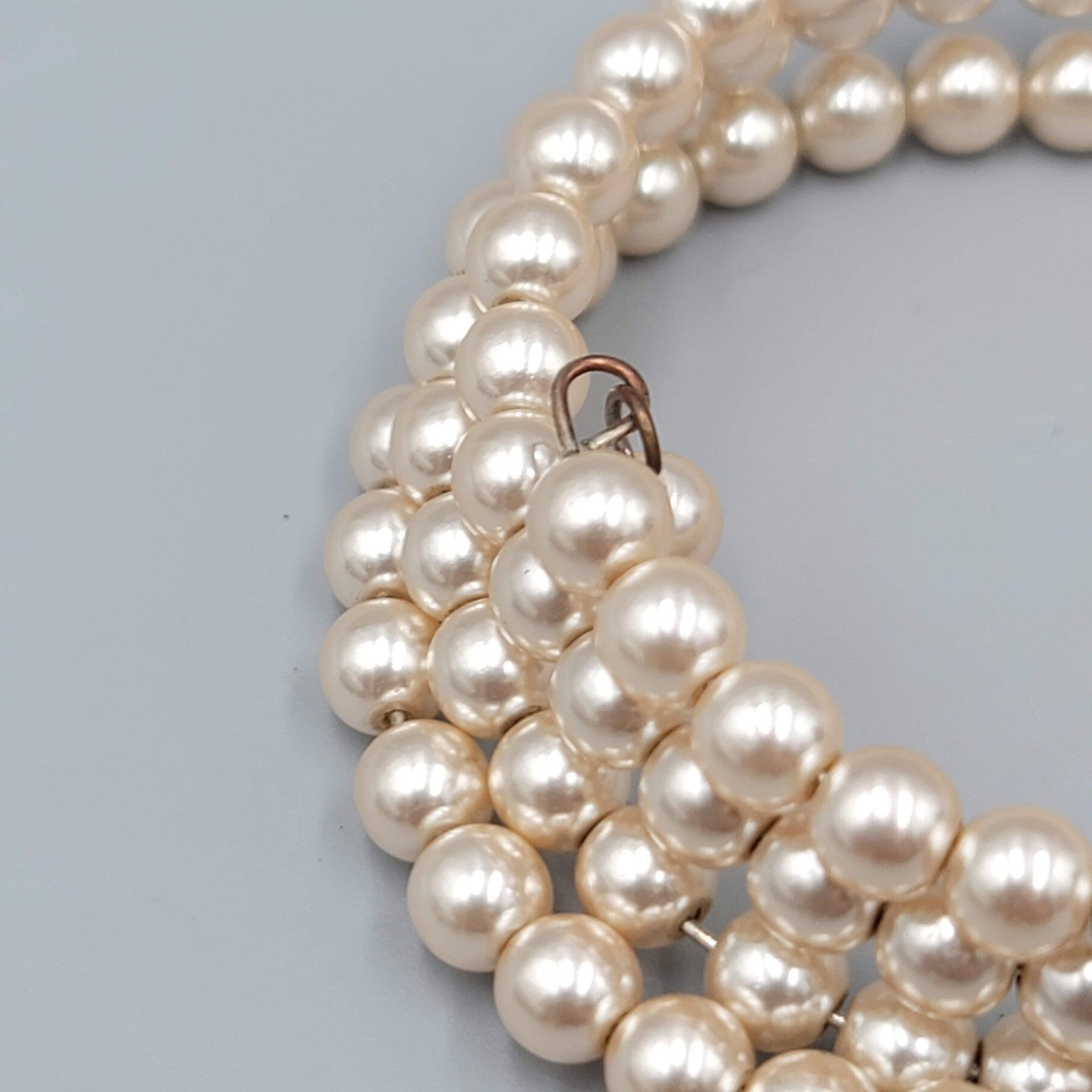 Vintage Monet Faux Pearl Beaded Coil Bracelet Womens Cream Three Row Memory Wire