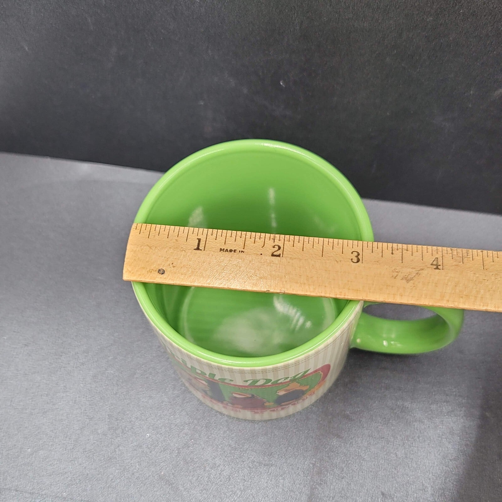 A Christmas Story Ceramic Coffee Mug Triple Dog Dare You Flagpole Scene Green