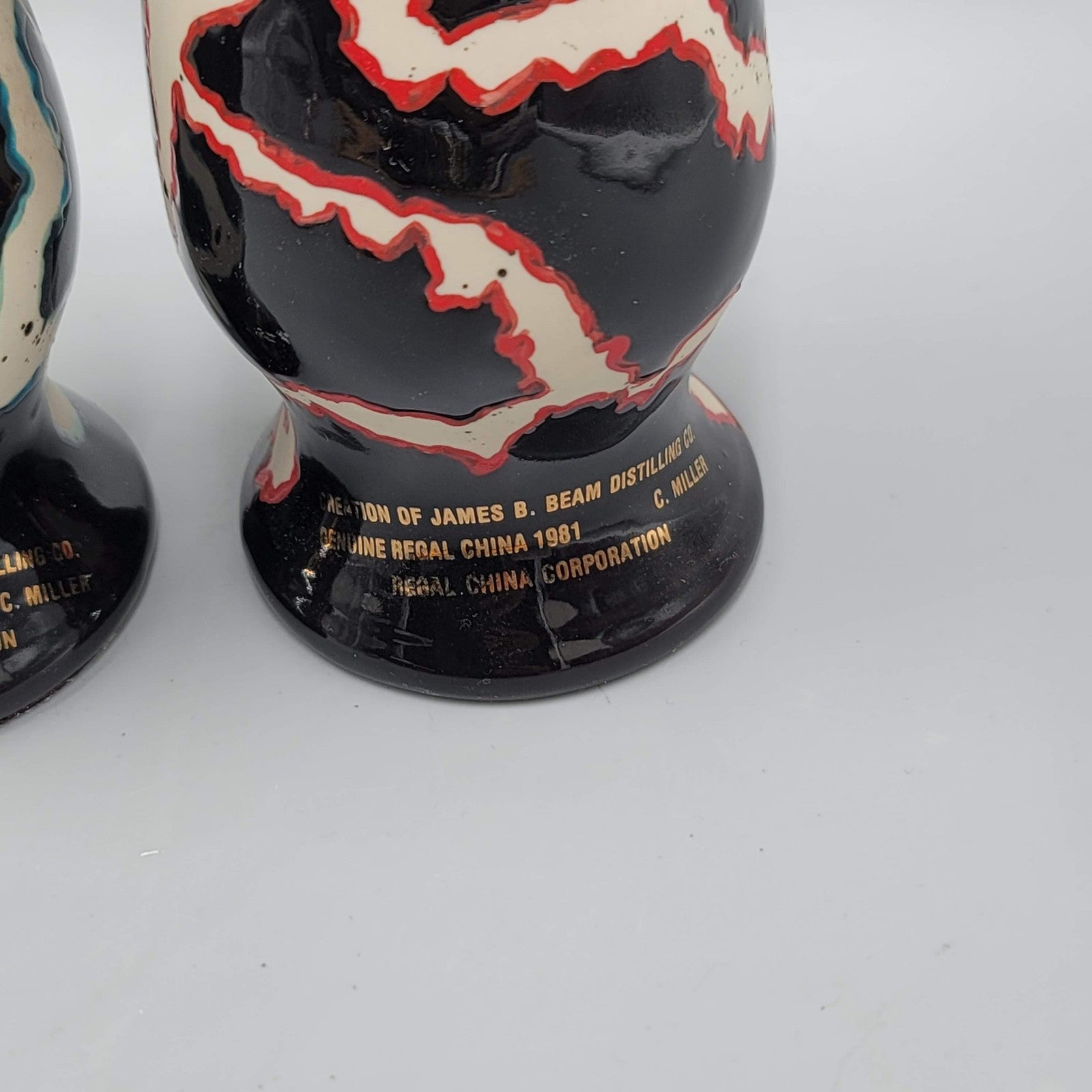 Vintage 1981 Jim Beam Regal China Lightning Paperweight Pair Black Red Teal