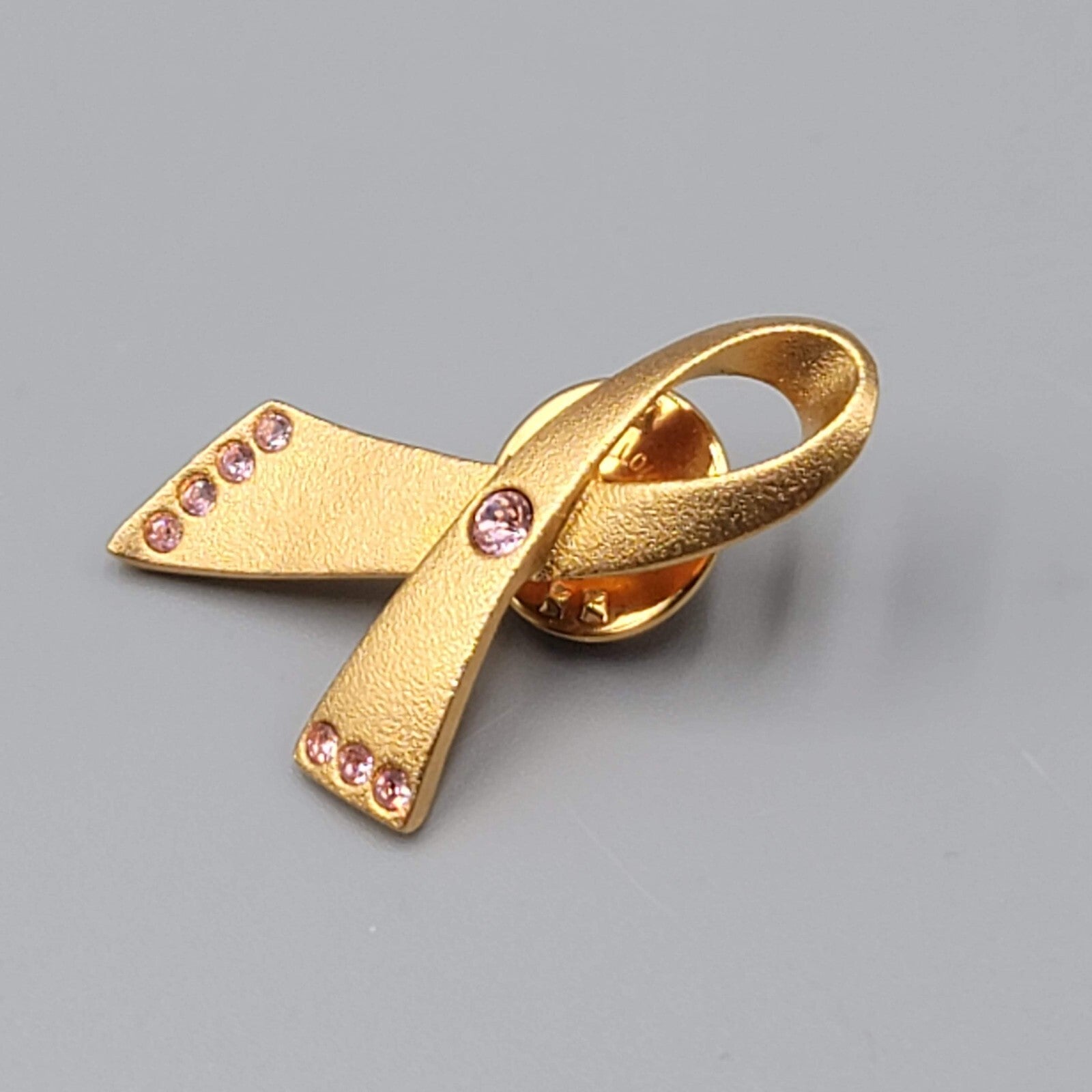 Vintage Avon Pin Gold tone Ribbon Pink Rhinestone 1 3/8"