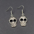 Embossed Skull Silver tone Dangle  Pierced Earrings New Halloween 1 1/8"
