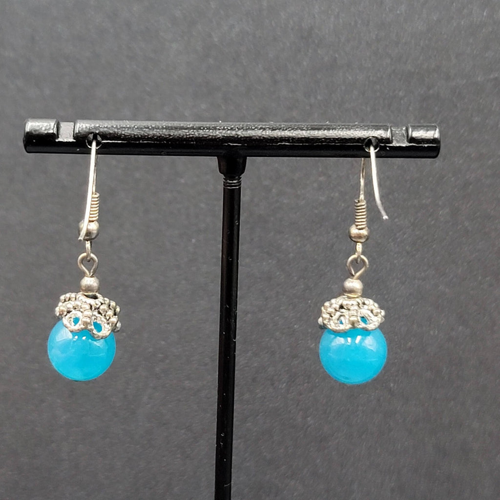 Pierced Earrings Silver tone Filigree Capped Blue Glass Bead Dangle 3/4"