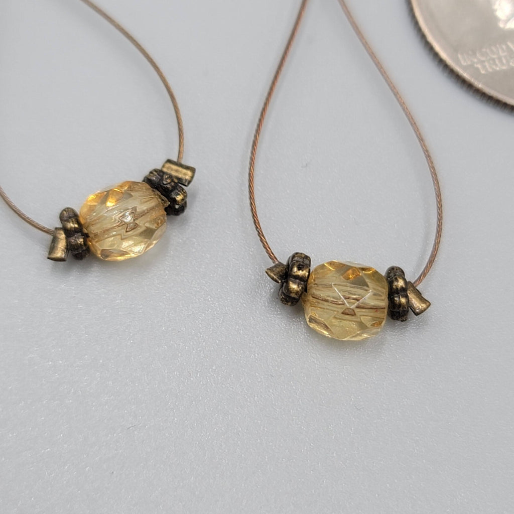 Pierced Earrings Bronze tone Teardrop Wire Yellow Glass Bead Dangle 1.5"