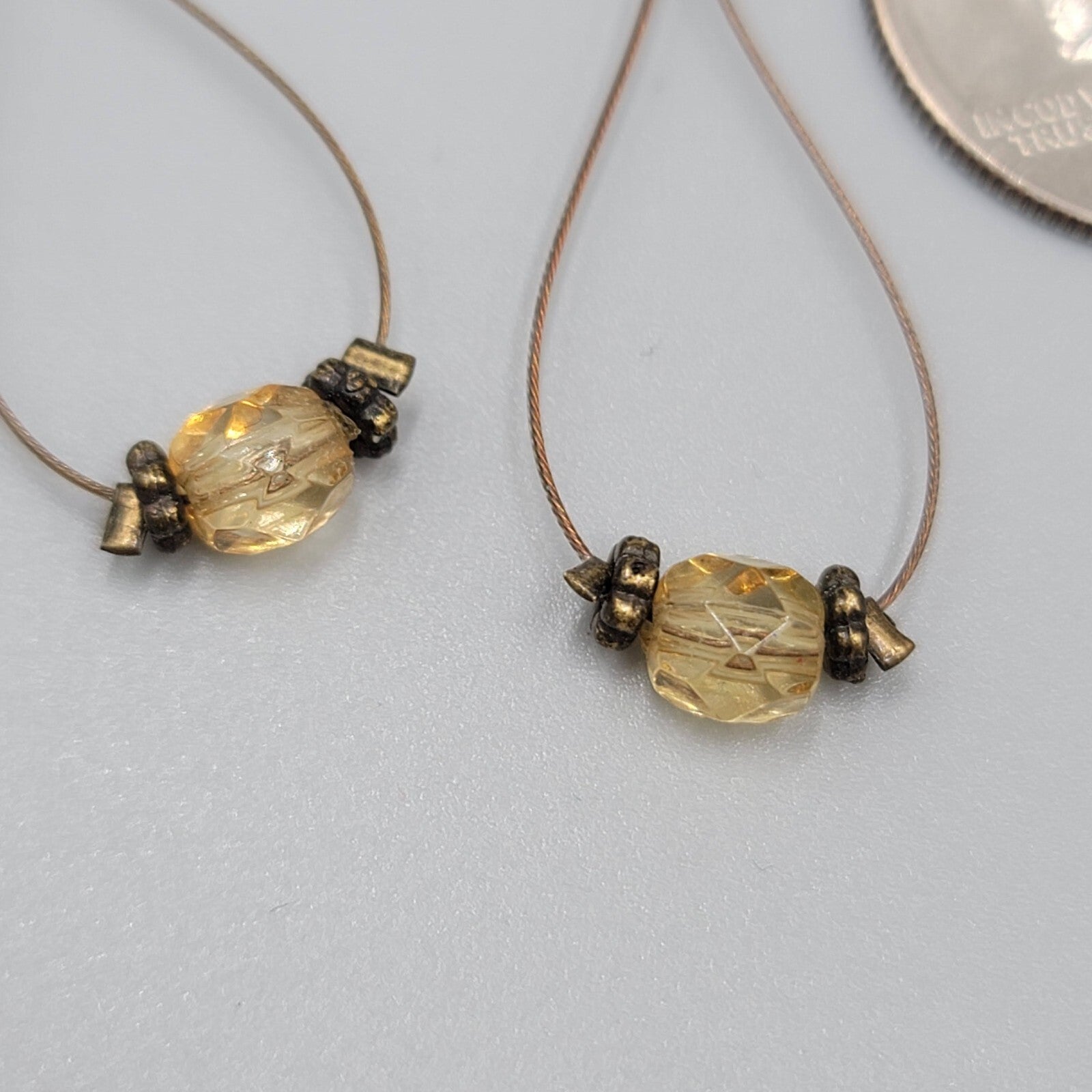 Pierced Earrings Bronze tone Teardrop Wire Yellow Glass Bead Dangle 1.5"