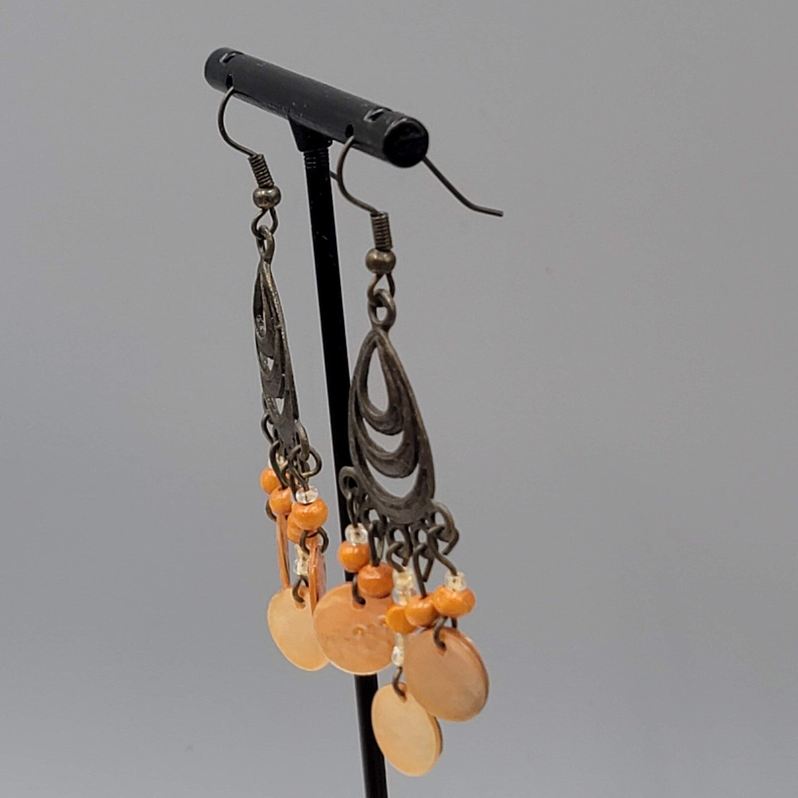 Bronze tone Chandelier Pierced Earrings Wood Bead Orange Shell Dangle 2"