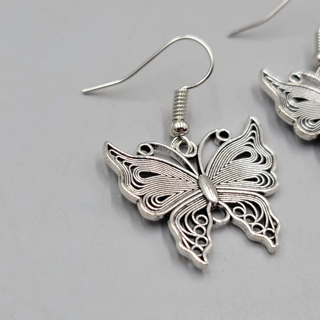 Filigree Butterfly Pierced Earrings Silver tone Dangle 1"
