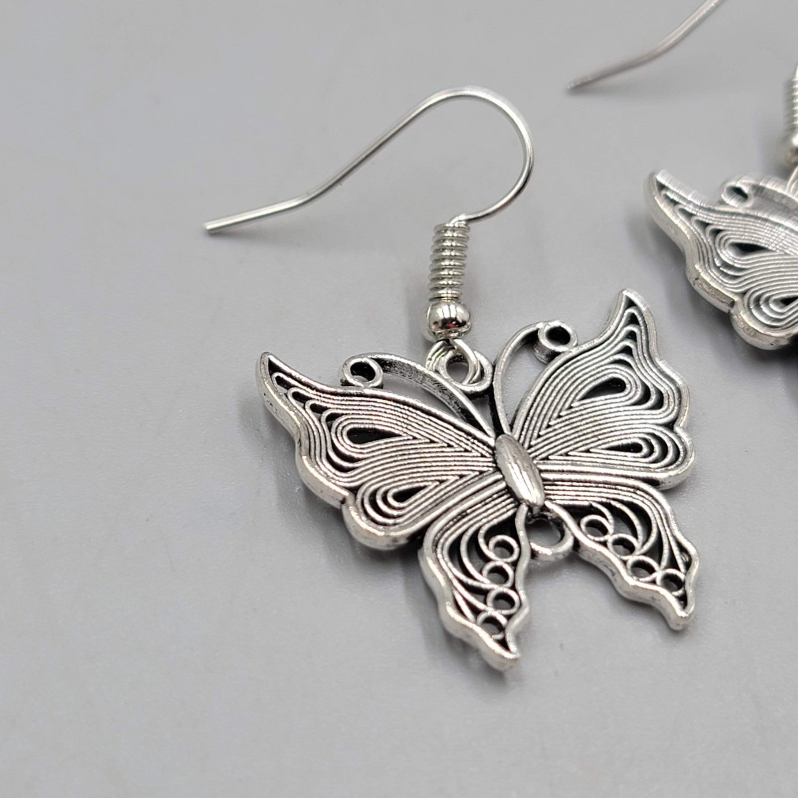 Filigree Butterfly Pierced Earrings Silver tone Dangle 1"