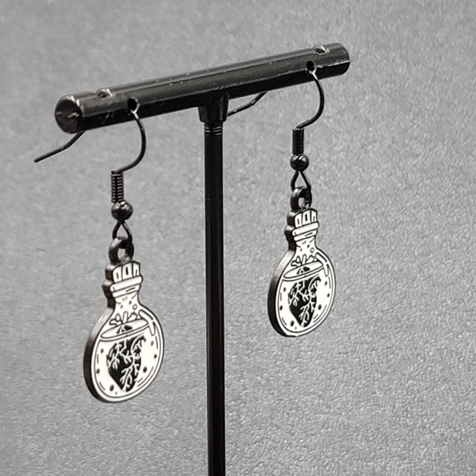 Poison Heart in Jar Pierced Earrings Black White Enamel Dangle 7/8" 