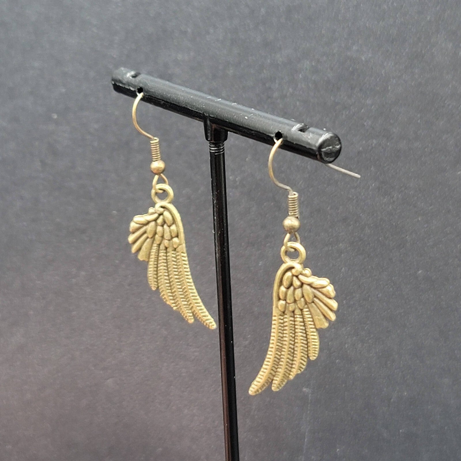 Feather Wings Pierced Earrings Bronze tone Metal Embossed Dangle 1 1/8"