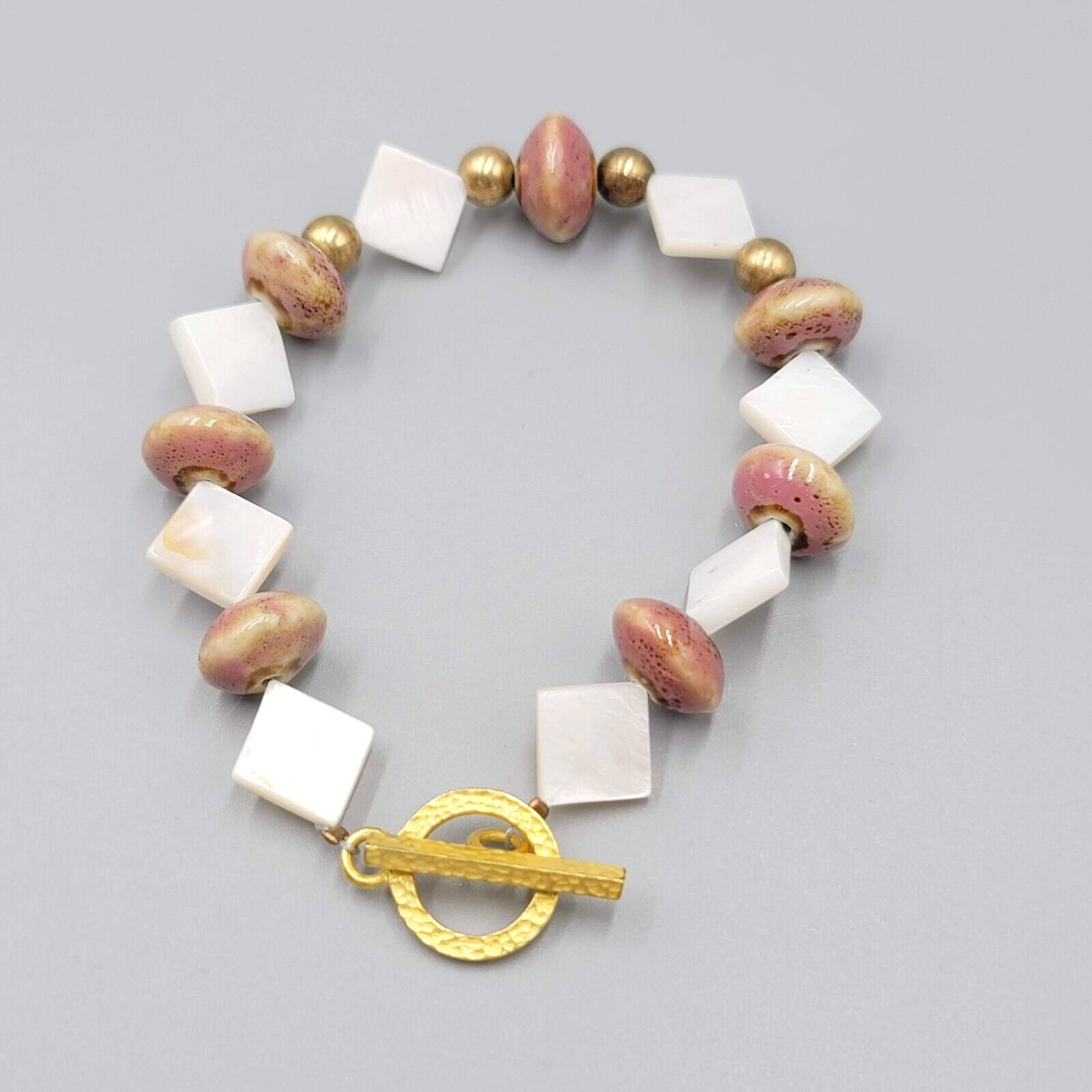 Beaded Bracelet Pottery and Mother of Pearl Beads Gold tone Toggle 6.75 in