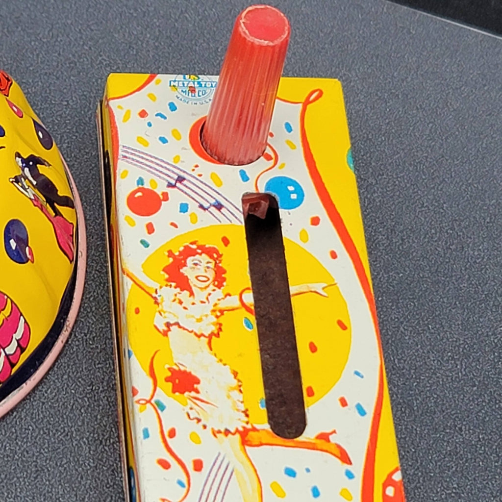 Vintage Litho US Metal Toys Noisemakers Lot of 2 New Years Dancers Made in USA