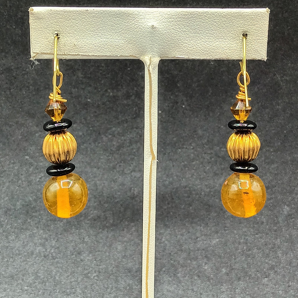 Pierced Earrings Gold tone Orange Black Beaded Statement Dangle 1.5"