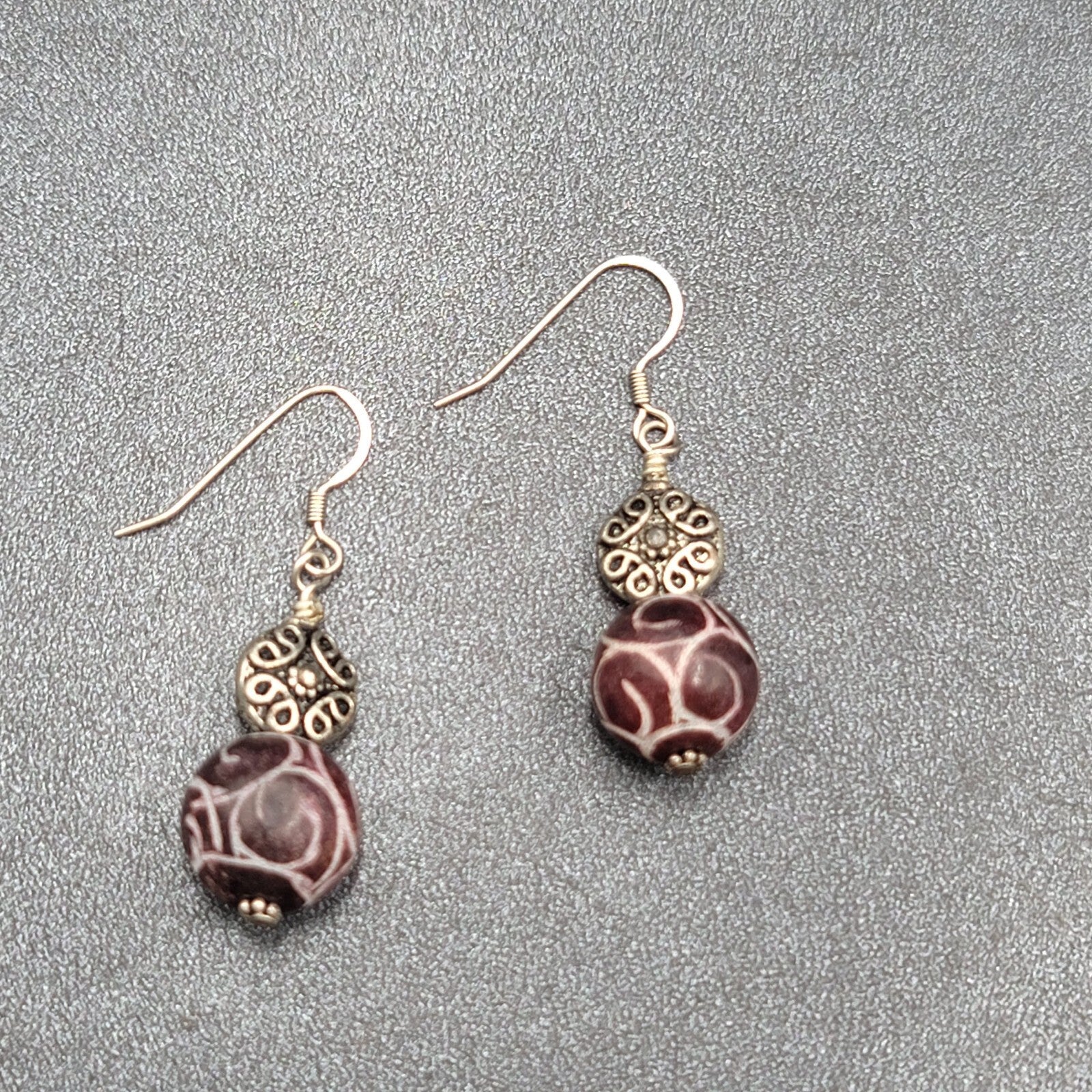 Pierced Earrings Silver tone Hand Carved Purple Stone Bead Dangle  1.25"