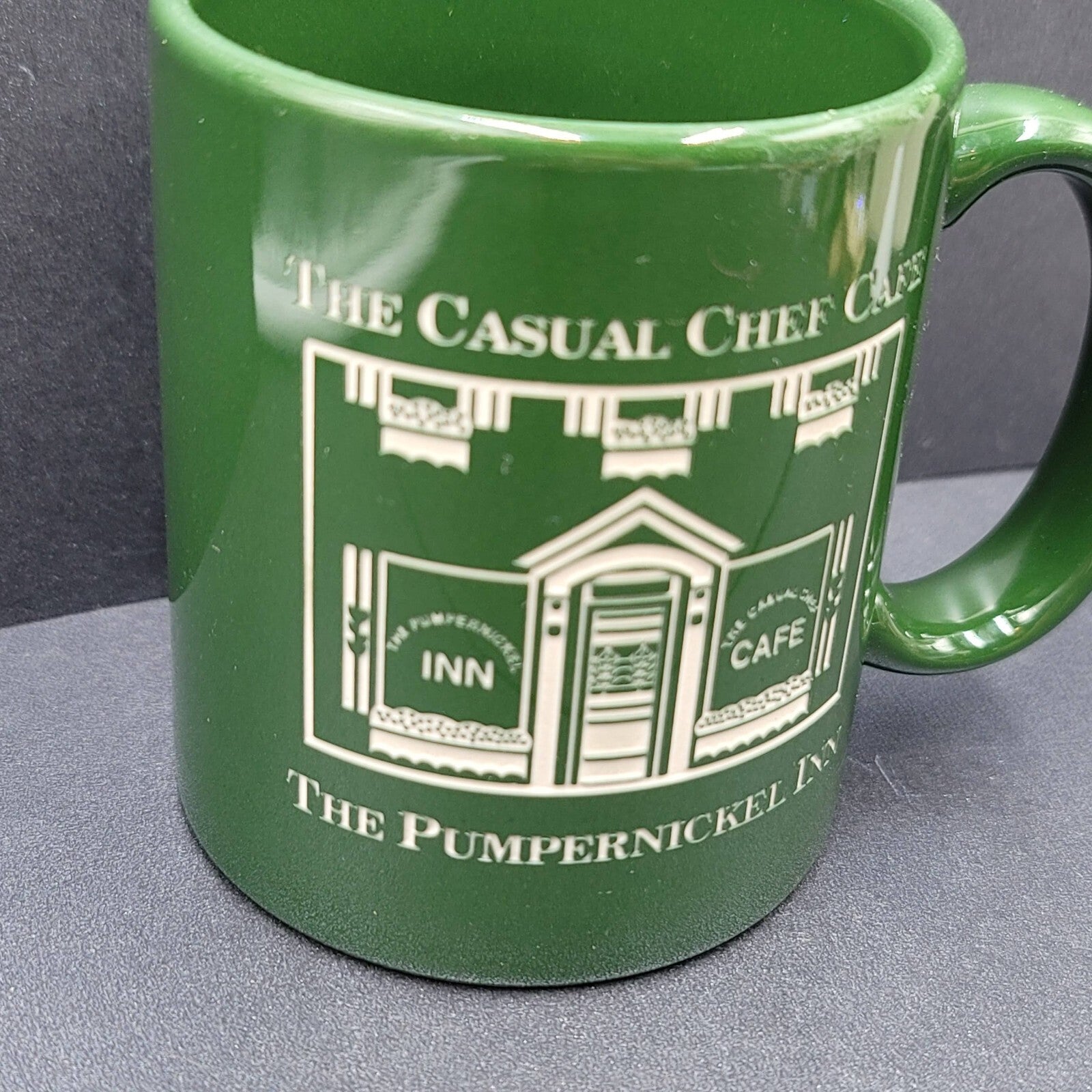 The Casual Chef Cafe Coffee Mug The Pumpernickel Inn Souvenir Green Etched