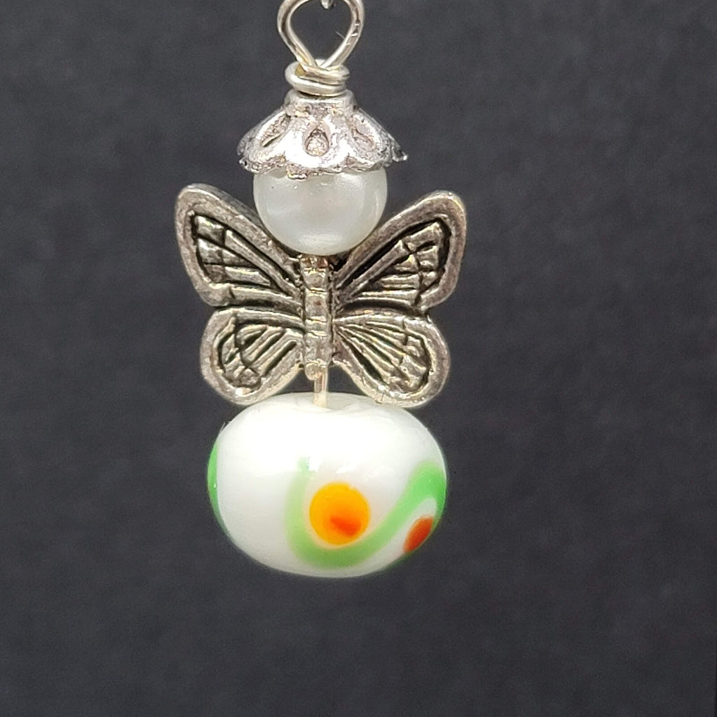 Pierced Earrings Silver tone Angel White Art Glass Bead Dangle 1"