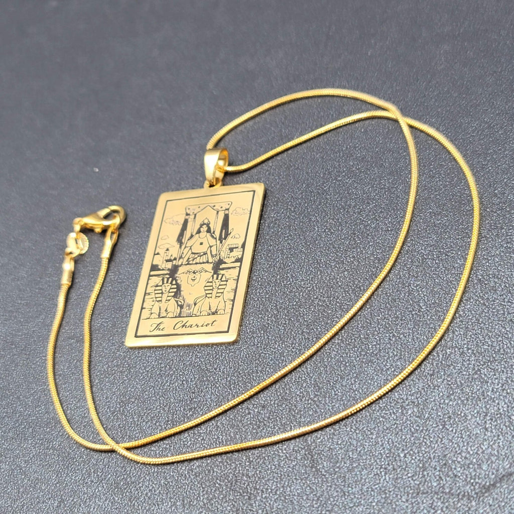 The CHARIOT Tarot Card Pendant Necklace Major Arcana Gold tone 18”.