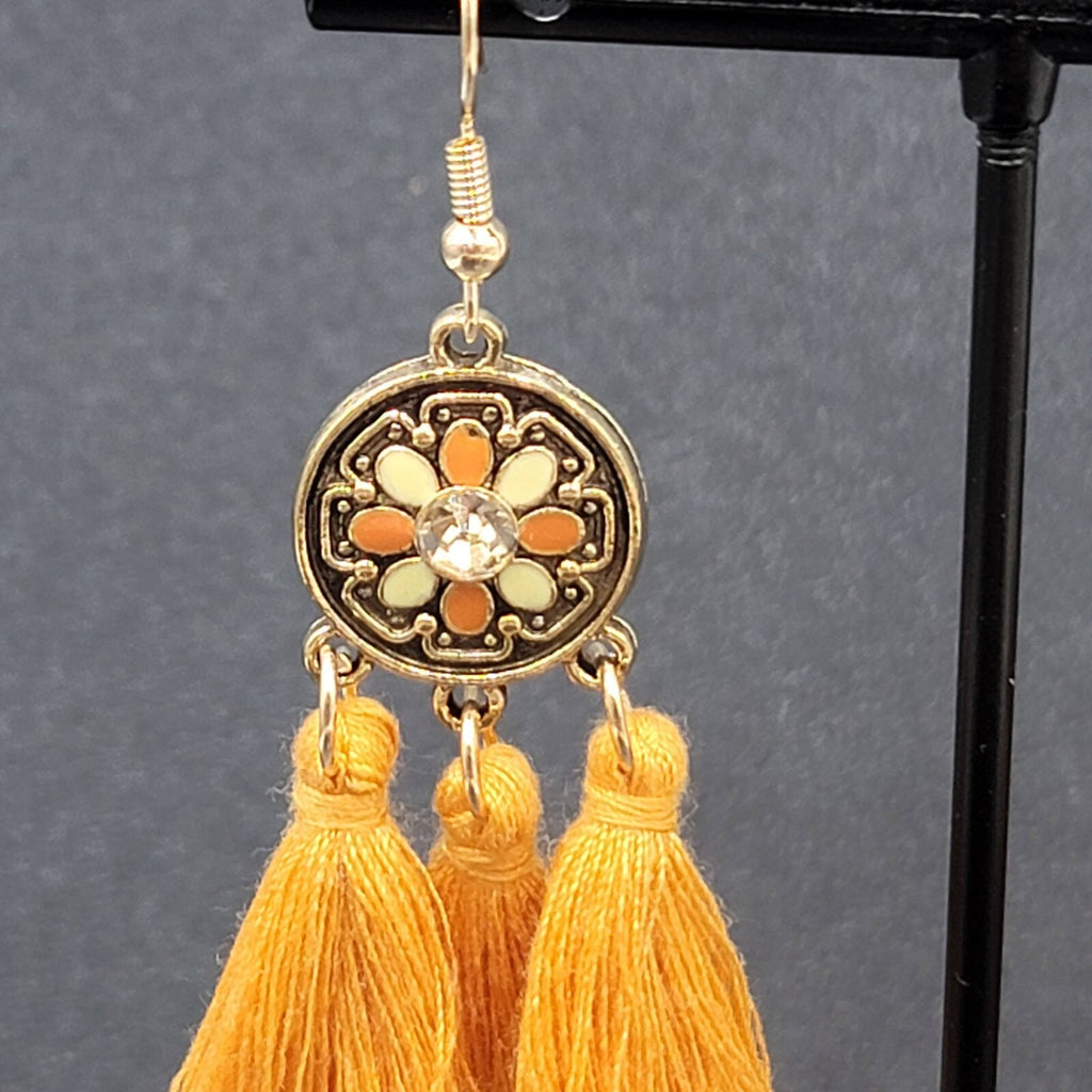 Pierced Earrings Gold tone Orange Tassel Rhinestone Medallion Dangle 1.75"