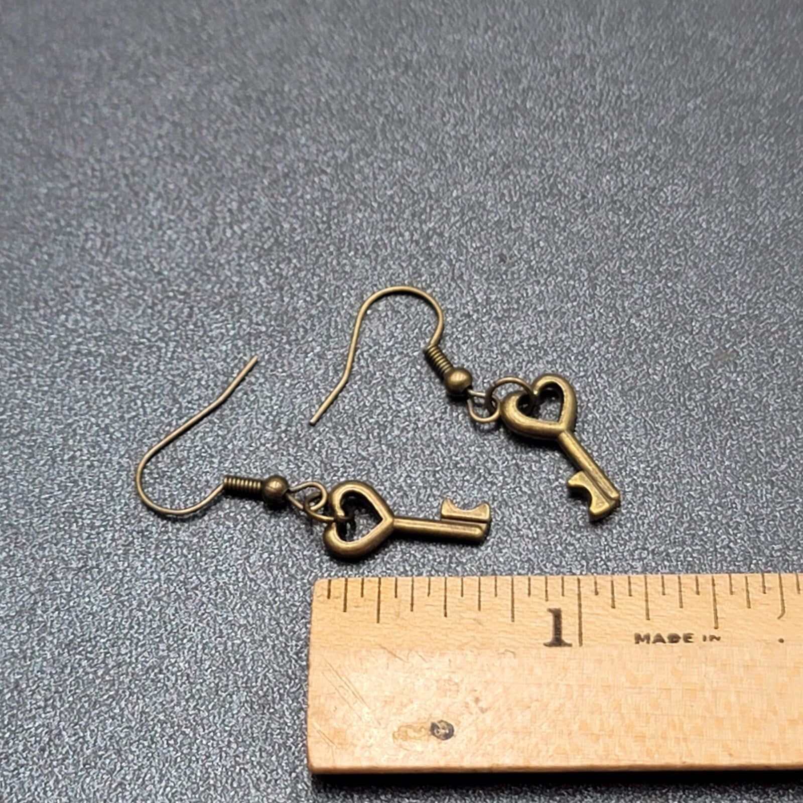 New Pierced Earrings Bronze tone Heart Skeleton Key Dangle 5/8"