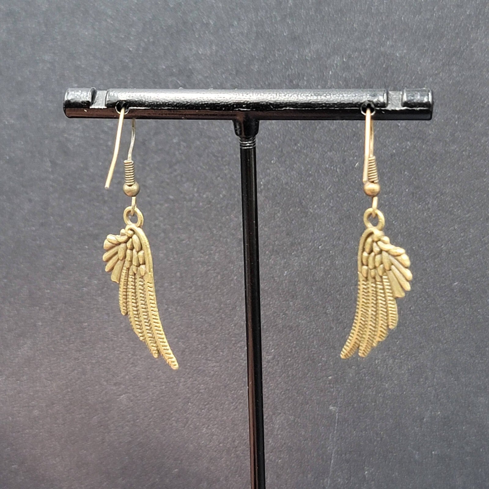 Feather Wings Pierced Earrings Bronze tone Metal Embossed Dangle 1 1/8"