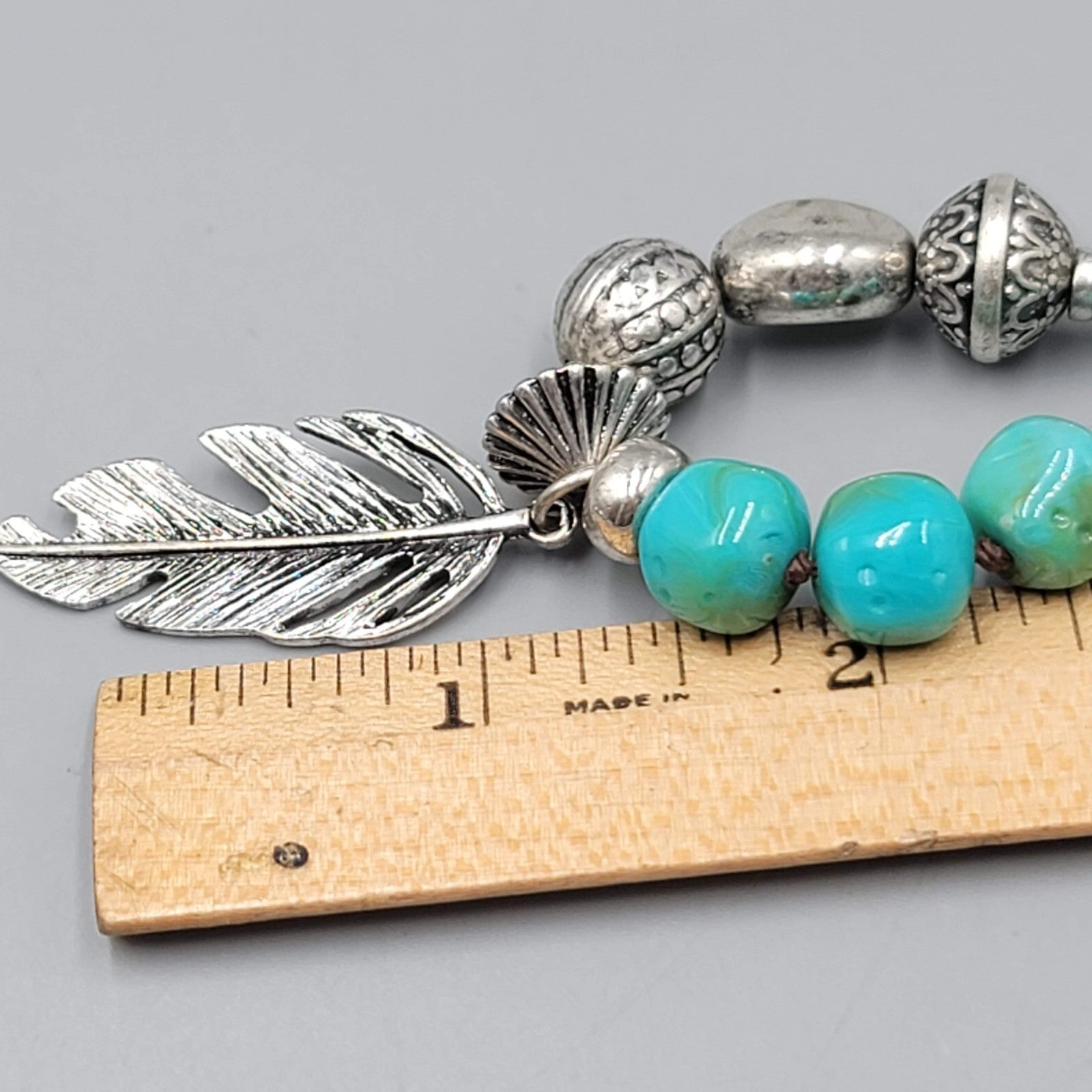 Louisa Bracelet Blue Pottery Bead Silver tone Feather Charm 6.75"-7.75"
