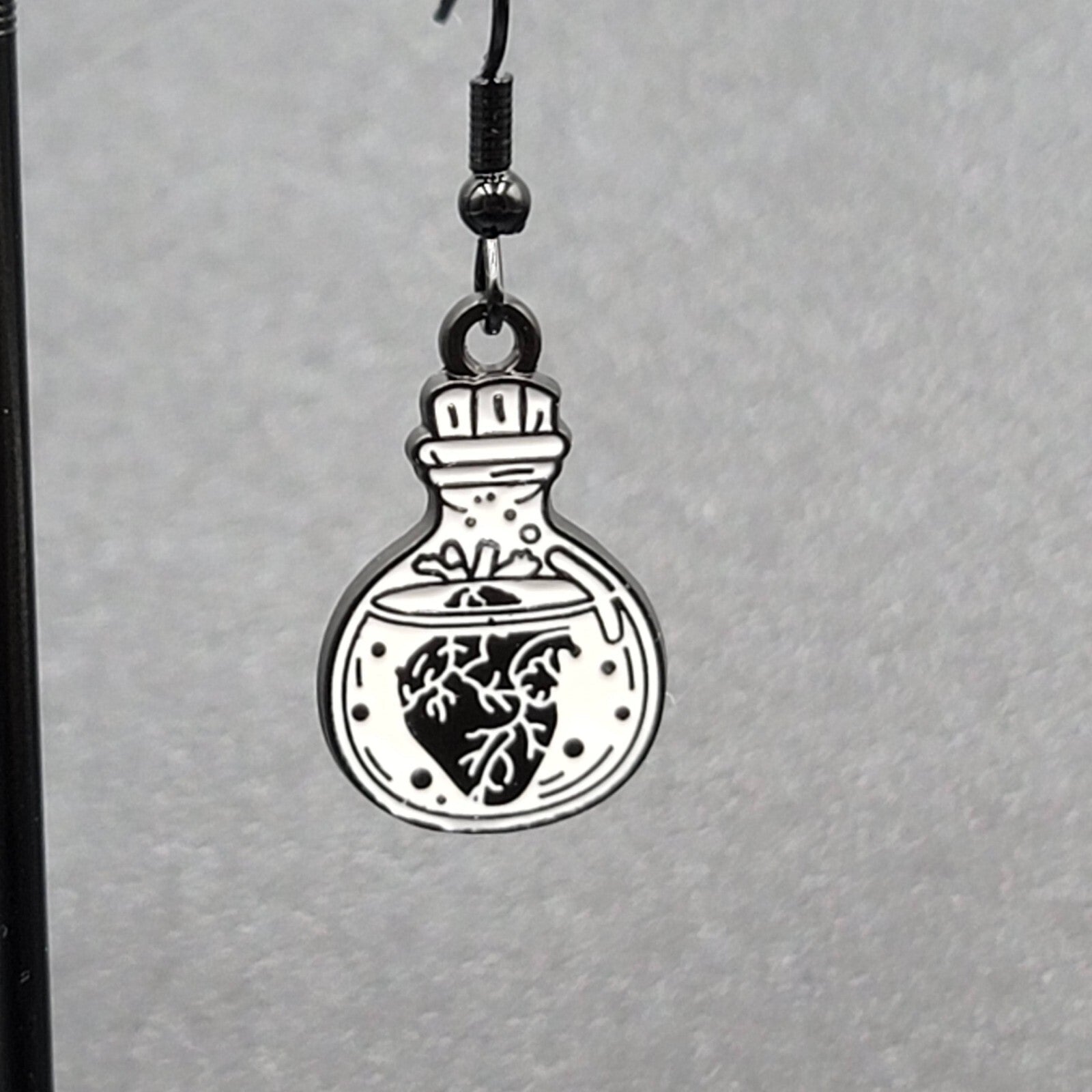 Poison Heart in Jar Pierced Earrings Black White Enamel Dangle 7/8" 