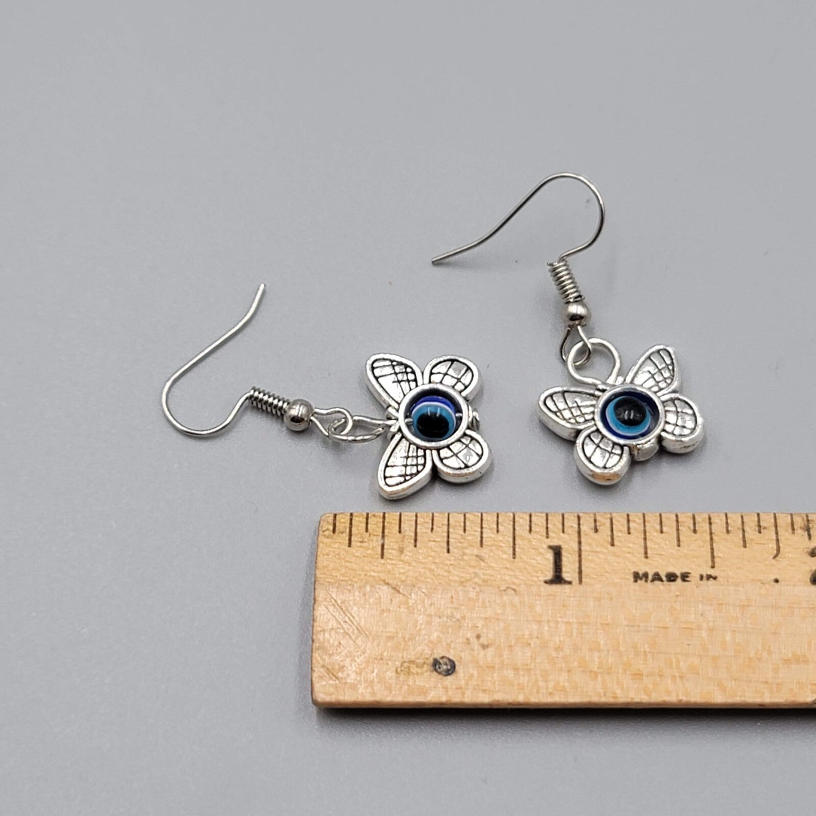 Butterfly Evil Eye Pierced Earrings Silver tone Blue Bead Dangle 5/8"