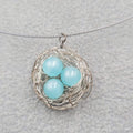 Birds Nest Pendant Necklace Blue Moonglow Beads Silver tone Wire 18"