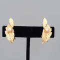 Vintage Climber Clip on Earrings Gold tone Textured Leaf White Bead 1.25"