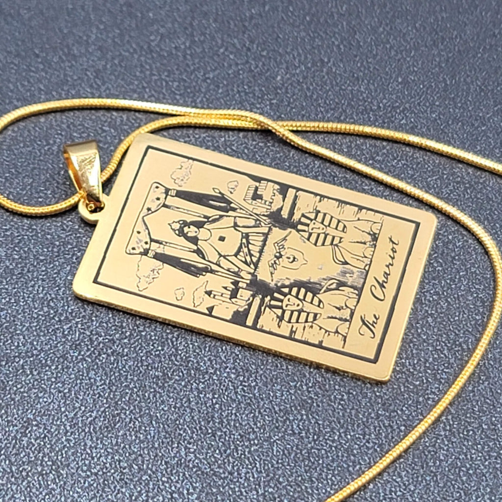 The CHARIOT Tarot Card Pendant Necklace Major Arcana Gold tone 18”.