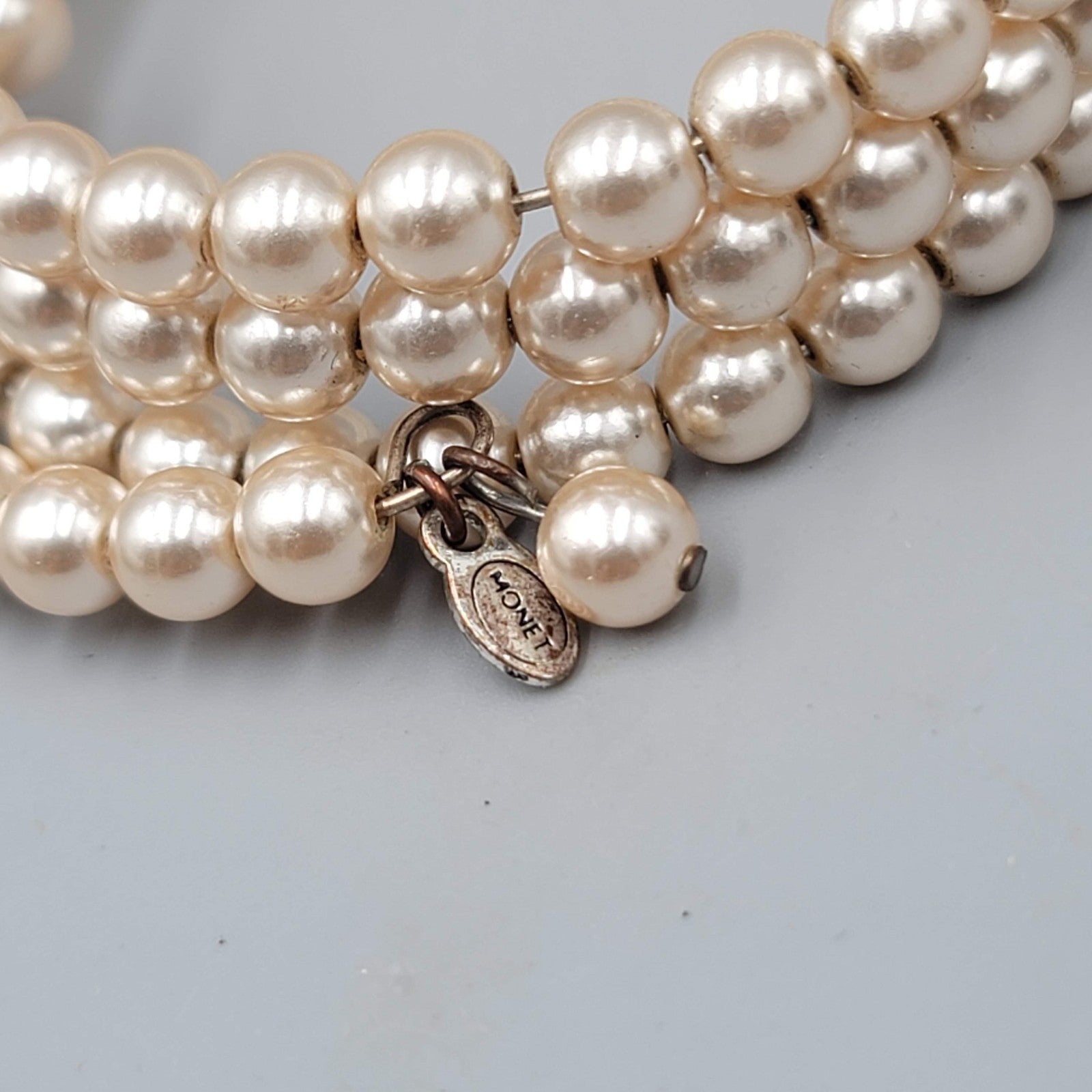 Vintage Monet Faux Pearl Beaded Coil Bracelet Womens Cream Three Row Memory Wire