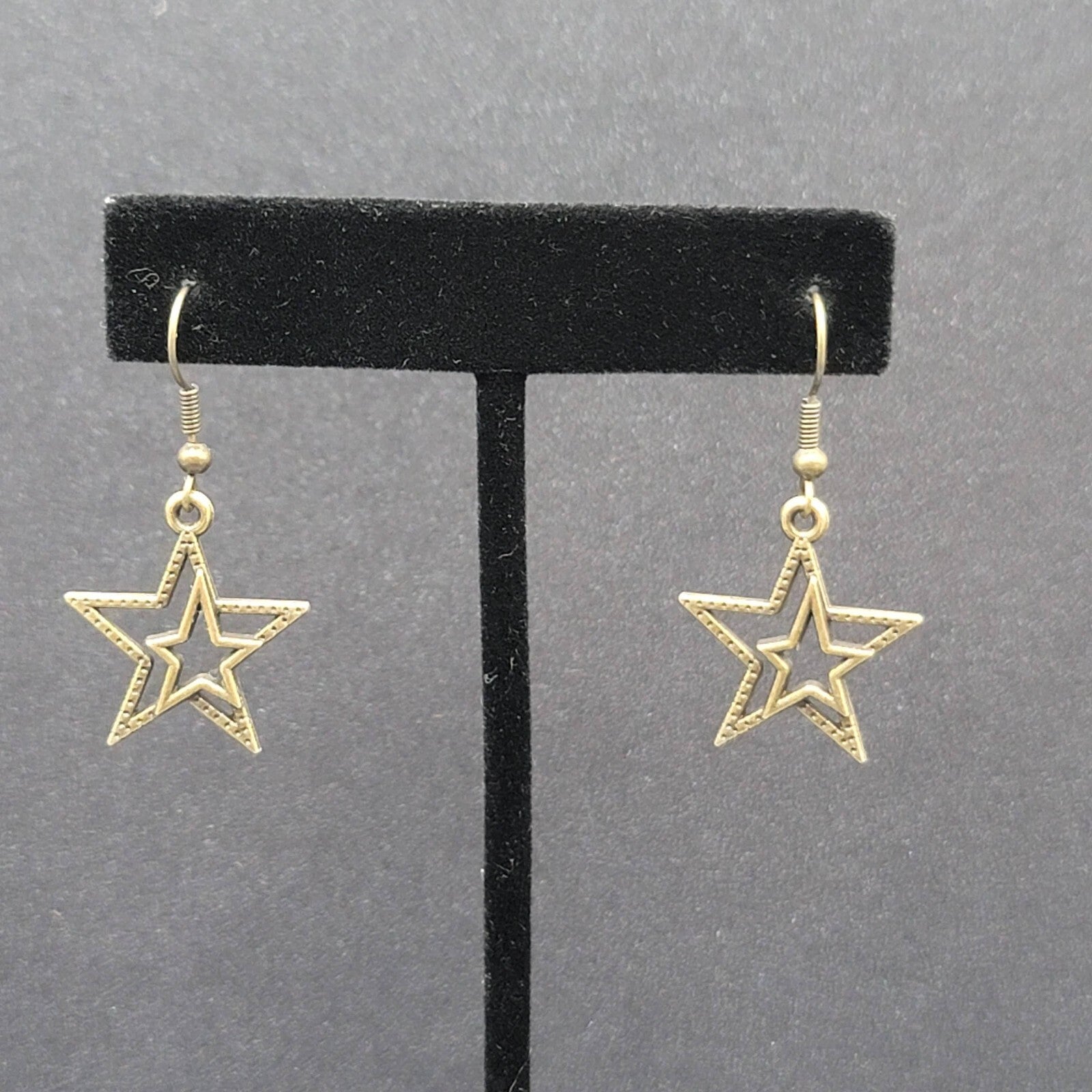 Pierced Earrings Bronze tone Double Open Star Dangle 7/8"