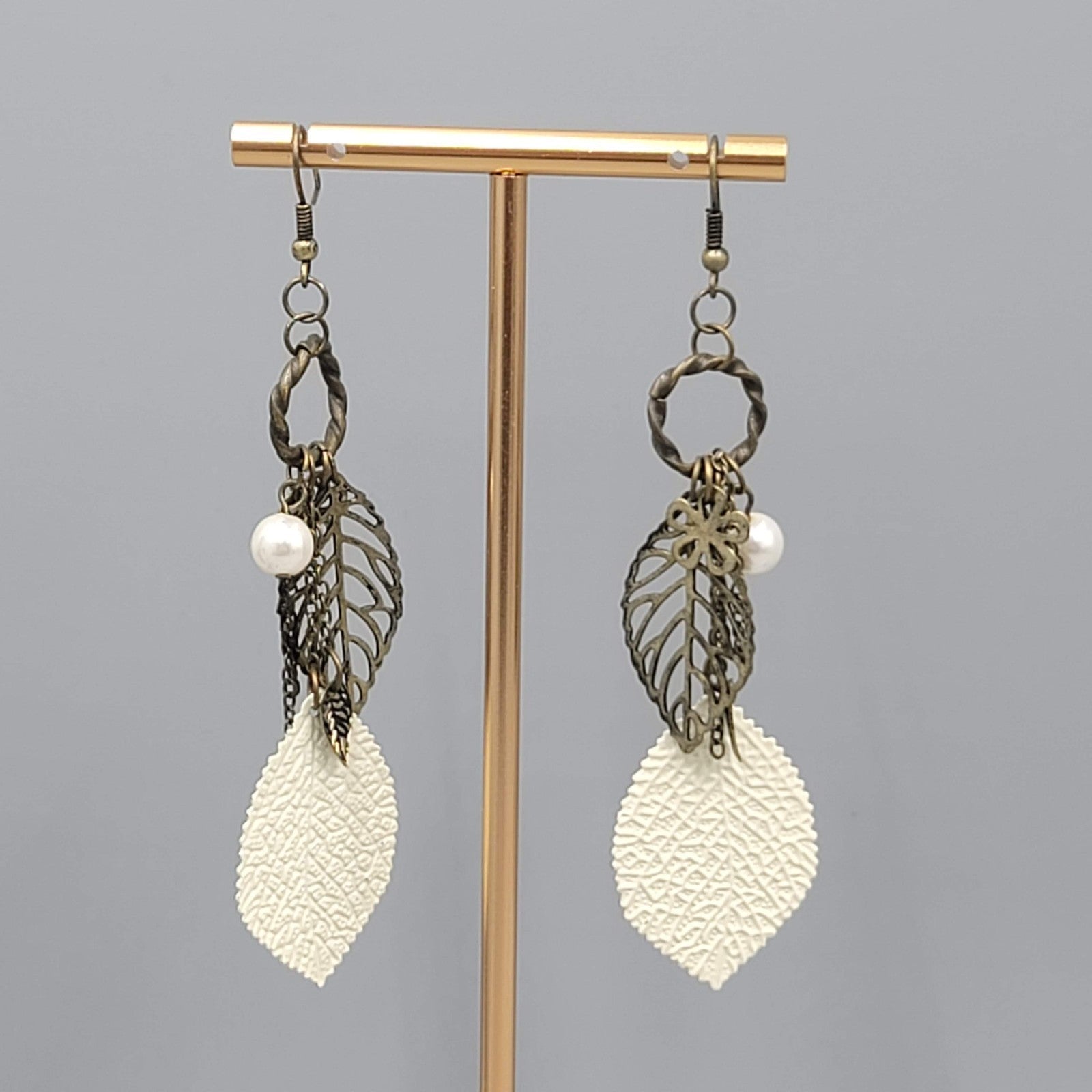 Boho White Enamel Leaf Pierced Earrings Bronze tone Dangle 3.25"