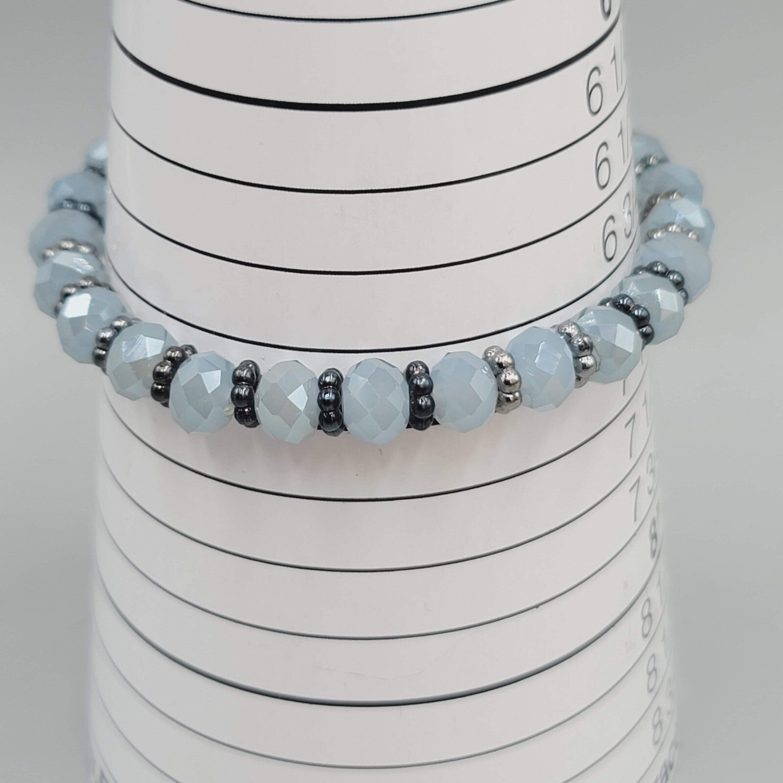 Blue Gray Faceted Crystal Bead Bracelet Gin Metal Gray Tassel Elastic 7 in