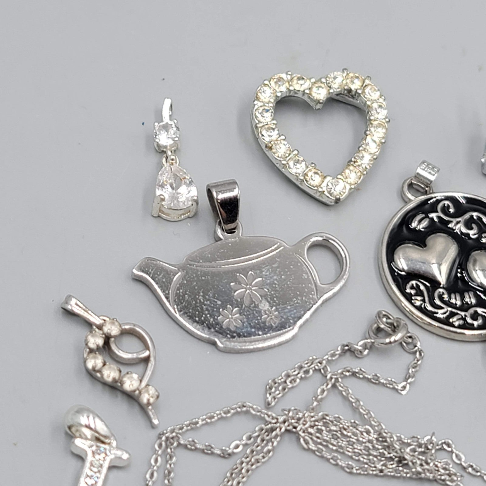 All Silver tone Pendant Lot of 16 Various Styles One Chain Included