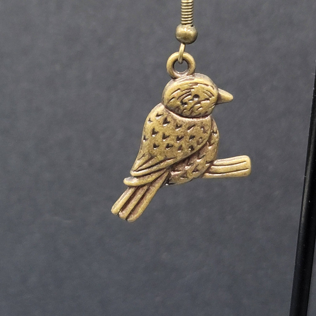 Bird on Perch Pierced Earrings Bronze tone Embossed Dangle 1"