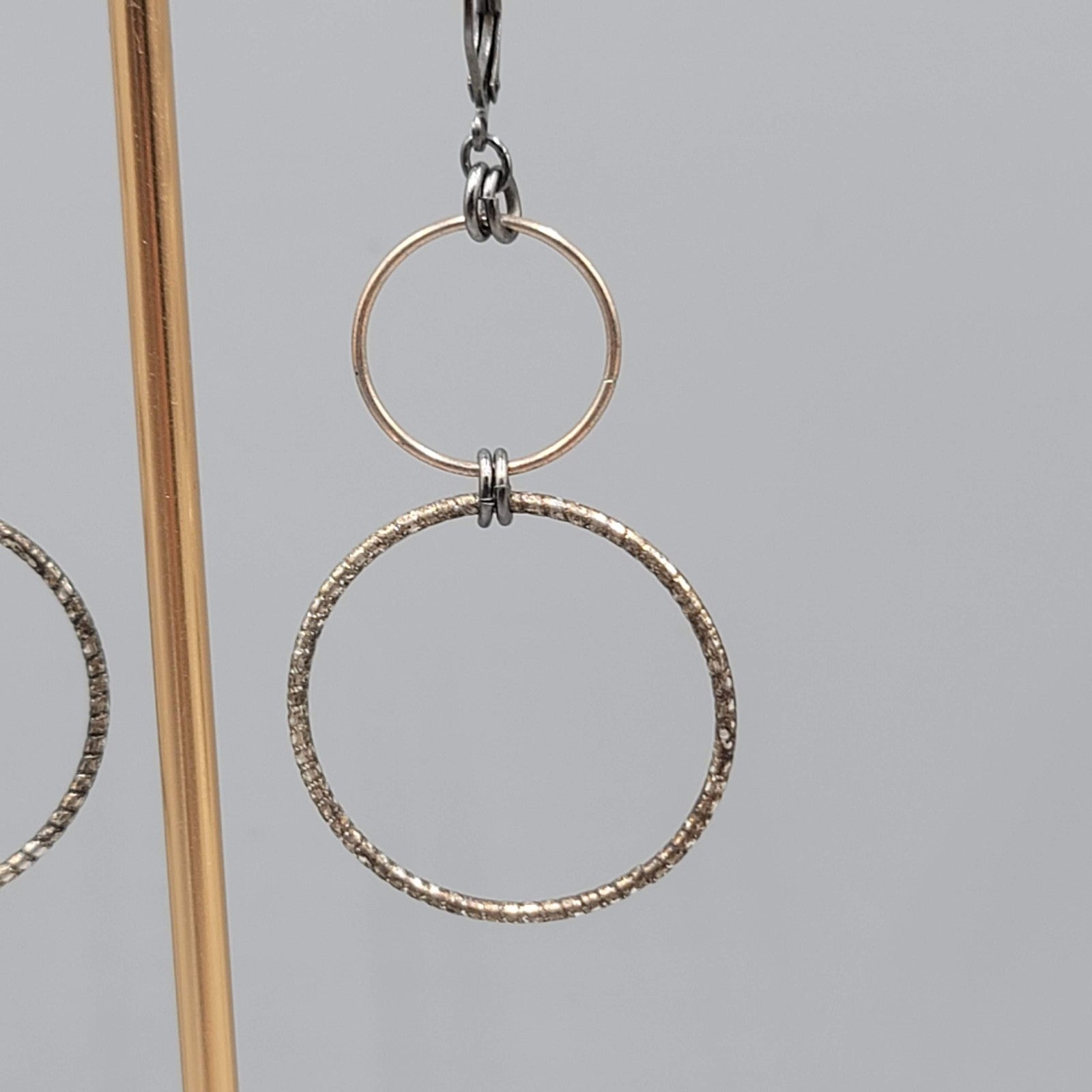 Pierced Earrings Black Gold tone Double Ring Dangle 2 in