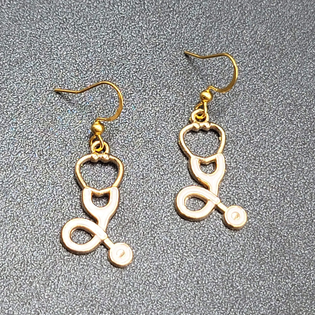 Nurse Pierced Earrings White Enamel Stethoscope Gold tone Dangle 1 1/8"